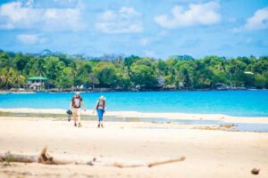 Couple strolling in the Blue Sea Corn Island