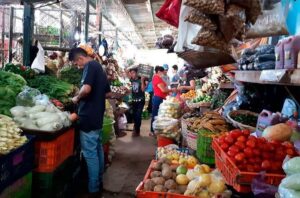 Vegetable and people selling produce 