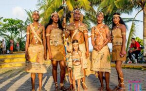 A group of black people dress in their traditional outfits