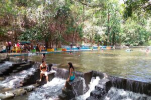 People swimming in Las Peñitas Carazo